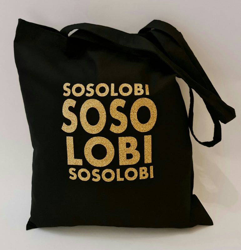 Speel, leer en groei met So So Lobi Shopper Gold van Colourful Goodies - Inclusiviteit in elk detail.