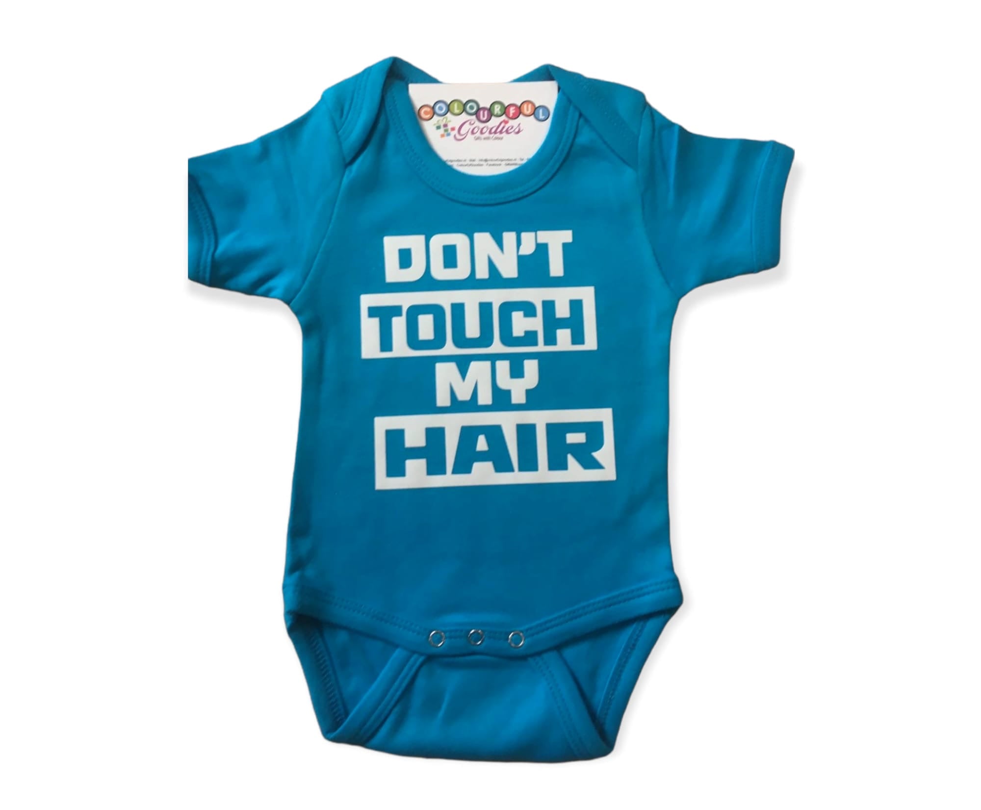 Speel, leer en groei met Don’t touch my hair romper van Colourful Goodies - Inclusiviteit in elk detail.